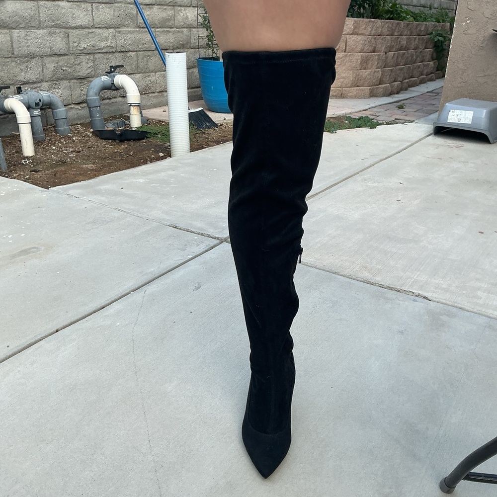 Elegant Black Over-the-Knee Boots can be worn different ways. 
Brand new